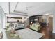 Open-concept living space with hardwood floors, lots of sunlight and an open floorplan at 3815 Harrison Crossing Ln, Greenwood, IN 46142