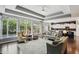 Spacious living room with lots of windows, hardwood floors and an open floorplan at 3815 Harrison Crossing Ln, Greenwood, IN 46142