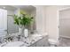 Bathroom with double sinks, granite countertops, and a walk-in closet at 3899 Sterling Dr, Whitestown, IN 46075
