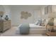 Bright bedroom with neutral tones, textured wall art, and a soft, inviting aesthetic at 3908 Andean Ct, Bargersville, IN 46106