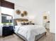 Comfortable bedroom featuring stylish decor, a cozy bed, and an en suite bathroom at 3924 Andean Ct, Bargersville, IN 46106