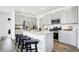 Bright and modern kitchen featuring a large island, stainless steel appliances, and ample counter space at 3924 Andean Ct, Bargersville, IN 46106