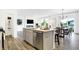 Stylish kitchen with a spacious island that overlooks the living room and dining room at 3924 Andean Ct, Bargersville, IN 46106