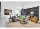 Comfortable living room with a gray sofa, unique lighting, and stylish decor at 3924 Andean Ct, Bargersville, IN 46106