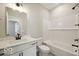 Modern bathroom with white subway tiles, vanity, and shower-tub combination at 3936 Sterling Dr, Whitestown, IN 46075