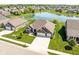 Desirable brick home in a lovely neighborhood setting, featuring a charming pond and picturesque green lawns at 4659 W Otway Ln, New Palestine, IN 46163
