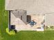 Aerial view highlighting the backyard patio with a gazebo, dining set, and built-in grill area at 4659 W Otway Ln, New Palestine, IN 46163