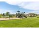 Community playground with swings, slides, and a covered picnic area, perfect for outdoor Gathering fun at 4659 W Otway Ln, New Palestine, IN 46163