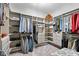 Large walk-in closet with custom shelving and ample storage space at 4659 W Otway Ln, New Palestine, IN 46163