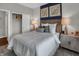 This comfortable bedroom is decorated with a wooden headboard and stylish bedside tables at 5151 Nettleton Way, Avon, IN 46123