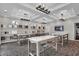 Bright design studio featuring multiple tables and sample design options at 5151 Nettleton Way, Avon, IN 46123