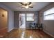 Cozy dining area with hardwood floors and ceiling fan, perfect for Gathering meals and gatherings at 5225 E St Clair St, Indianapolis, IN 46219