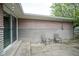 Exterior shot of a cozy patio with chairs and a small table at 5225 E St Clair St, Indianapolis, IN 46219
