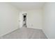 Bright bedroom featuring neutral carpeting and light-colored walls for a cozy, adaptable space at 5236 Honey Comb Ln, Indianapolis, IN 46221
