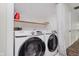 Functional laundry area with modern washer and dryer, offering convenience and efficiency at 5236 Honey Comb Ln, Indianapolis, IN 46221