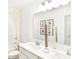 Bathroom featuring a double sink vanity, quartz countertops, and decorative accents at 5312 Summerton St, McCordsville, IN 46055