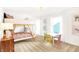 Playful bedroom featuring a bunk bed, colorful chairs, and cheerful decor at 5312 Summerton St, McCordsville, IN 46055
