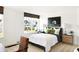 Well-lit bedroom with a large window and sport-themed decor at 5312 Summerton St, McCordsville, IN 46055