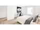 Bright bedroom showcasing modern decor, artwork, and a cozy sleeping space at 5312 Summerton St, McCordsville, IN 46055