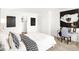 Stylish bedroom featuring modern decor, artwork, and a cozy sleeping space at 5312 Summerton St, McCordsville, IN 46055