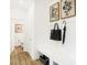 Well-appointed entryway with bench seating, decorative wall art, and convenient storage options at 5312 Summerton St, McCordsville, IN 46055