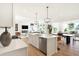 Bright open concept with views to the kitchen and living spaces, and stainless appliances at 5312 Summerton St, McCordsville, IN 46055
