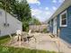 Backyard patio with an outdoor dining set, perfect for entertaining and relaxing outdoors at 547 W Taylor St, Shelbyville, IN 46176