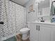 Clean bathroom featuring a vanity sink, modern fixtures, and tile shower at 547 W Taylor St, Shelbyville, IN 46176
