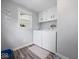 Well-organized laundry room featuring side-by-side washer and dryer units at 547 W Taylor St, Shelbyville, IN 46176
