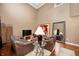 Beautiful living room with hardwood floors, high ceilings, and stylish furnishings at 6026 Pennyworth Cir, Indianapolis, IN 46203