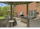 Inviting back deck area with outdoor seating, barbecue grill, and a luxurious hot tub at 6230 E 56Th St, Indianapolis, IN 46226
