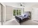 Cozy bedroom featuring natural light, a large window and simple stylish decor at 6230 E 56Th St, Indianapolis, IN 46226