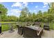 Deck with cozy seating area and a fire pit, perfect for outdoor relaxation at 6230 E 56Th St, Indianapolis, IN 46226