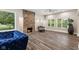 Spacious living room with hardwood floors, fireplace, and ample natural light at 6230 E 56Th St, Indianapolis, IN 46226