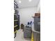 This carpeted storage room is equipped with ample space and contains a safe for storing your valuables at 6230 E 56Th St, Indianapolis, IN 46226