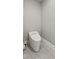 Neutral toned bathroom with a modern electronic toilet unit at 6230 E 56Th St, Indianapolis, IN 46226