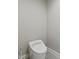 Modern toilet unit with electronic features in a neutrally painted bathroom at 6230 E 56Th St, Indianapolis, IN 46226