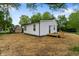 Backyard featuring grass, a wooden deck and privacy from mature trees at 650 Overstreet St, Franklin, IN 46131