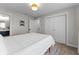 Bright bedroom with white trim, plush carpeting, and bright natural light at 650 Overstreet St, Franklin, IN 46131