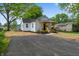 Renovated white brick home with a cozy front porch and inviting curb appeal at 650 Overstreet St, Franklin, IN 46131