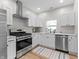 Bright kitchen featuring white cabinets, stainless steel appliances, and updated countertops at 650 Overstreet St, Franklin, IN 46131