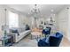 Bright living room with open layout, modern decor, hardwood floors, and natural light at 650 Overstreet St, Franklin, IN 46131