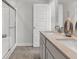 Bright bathroom features double sinks, tile floors, and large shower at 6683 Halsey St, Zionsville, IN 46077