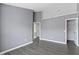 Spacious bedroom features a walk-in closet and light-colored walls, creating a bright and airy feel at 6916 Havenmoor Pl, Indianapolis, IN 46250