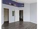 A spacious bedroom with neutral paint, and a large doorway that leads to a closet at 6916 Havenmoor Pl, Indianapolis, IN 46250