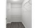 Walk-in closet with custom shelving for maximum organization at 6916 Havenmoor Pl, Indianapolis, IN 46250