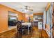 Dining room with wood floors connecting living room and kitchen at 6925 W State Road 128, Frankton, IN 46044