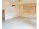 A spacious bedroom with large windows and light-colored walls at 704 E Perry St, Indianapolis, IN 46227