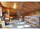 Charming attic space with wooden walls and ceiling, carpeted floors, and a cozy rustic ambiance at 7335 Bethany Park, Martinsville, IN 46151