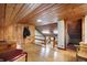 Spacious attic area features wood floors, paneled walls, and plenty of natural light at 7335 Bethany Park, Martinsville, IN 46151
